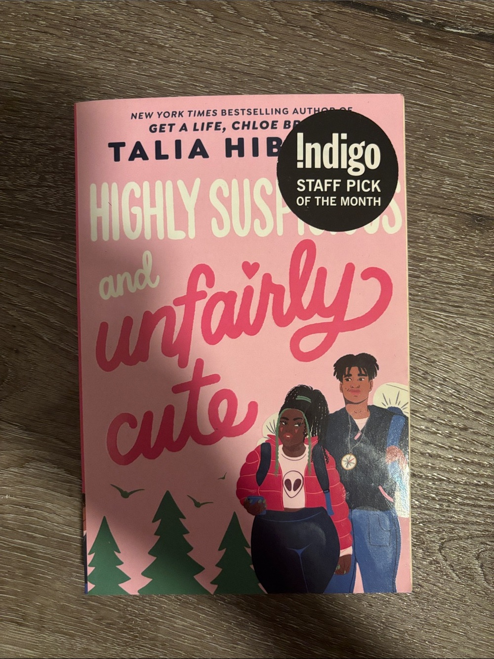 Revolution Pink Paperback with Green Accents and Black Text